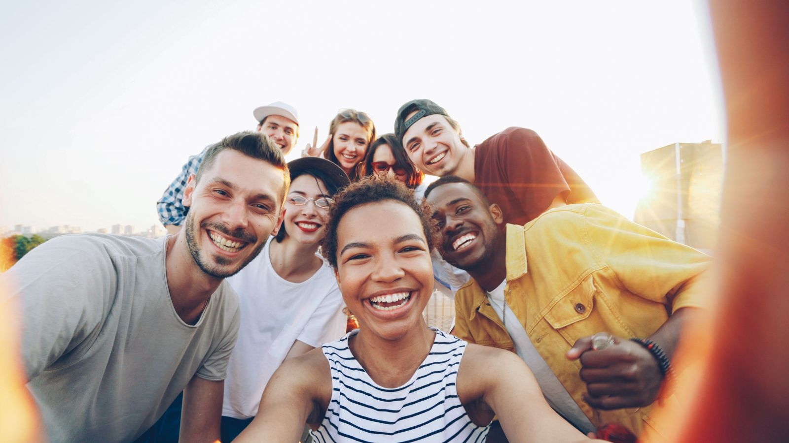 A smiling group of neighbors taking a photo together